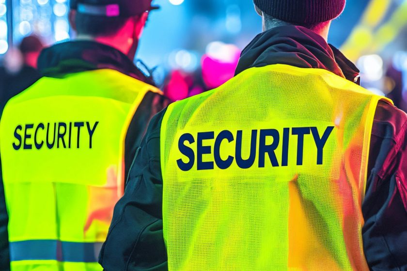 Nighttime event security personnel ensuring the safety and order of attendees through vigilant monitoring